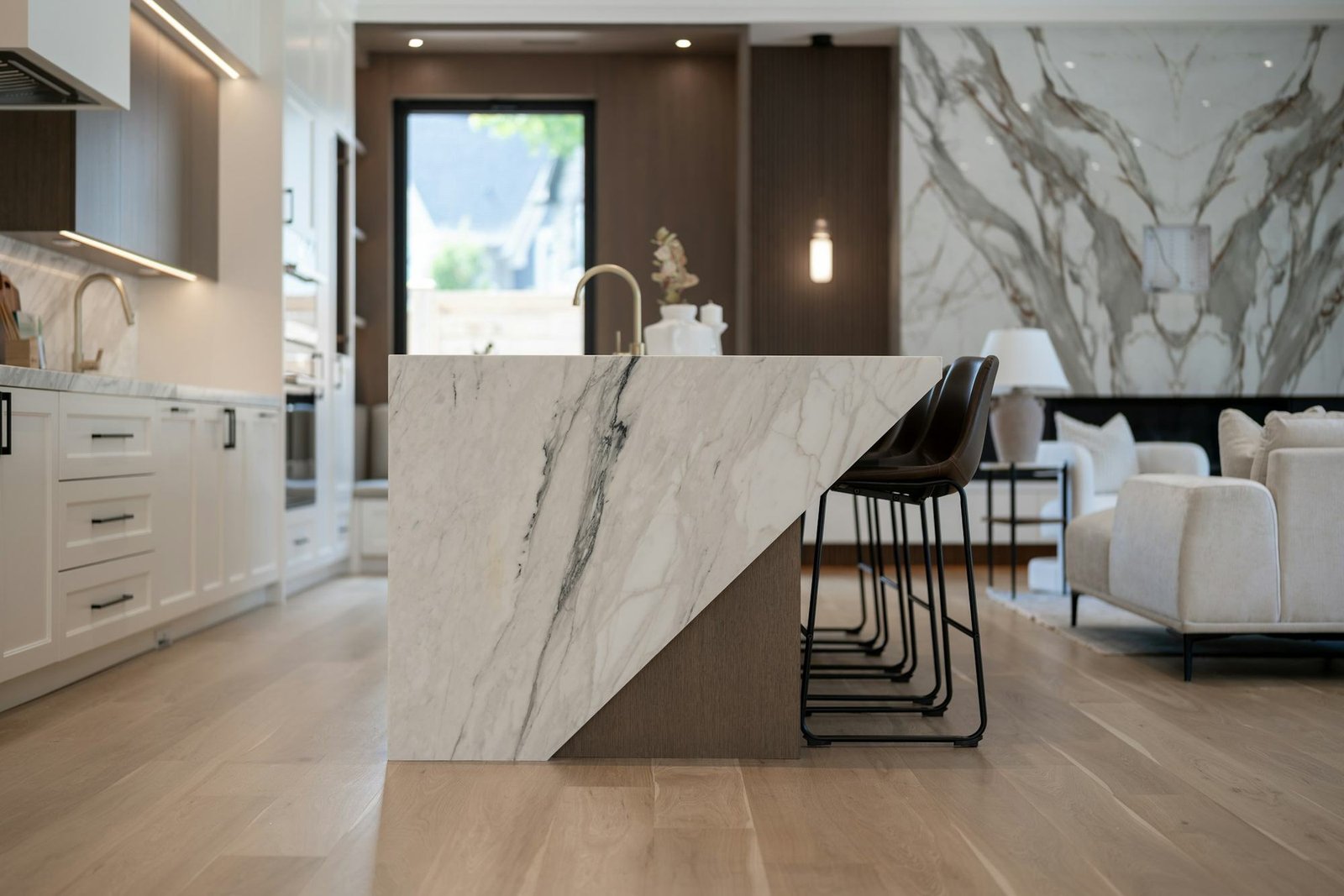 Marble waterfall island kitchen